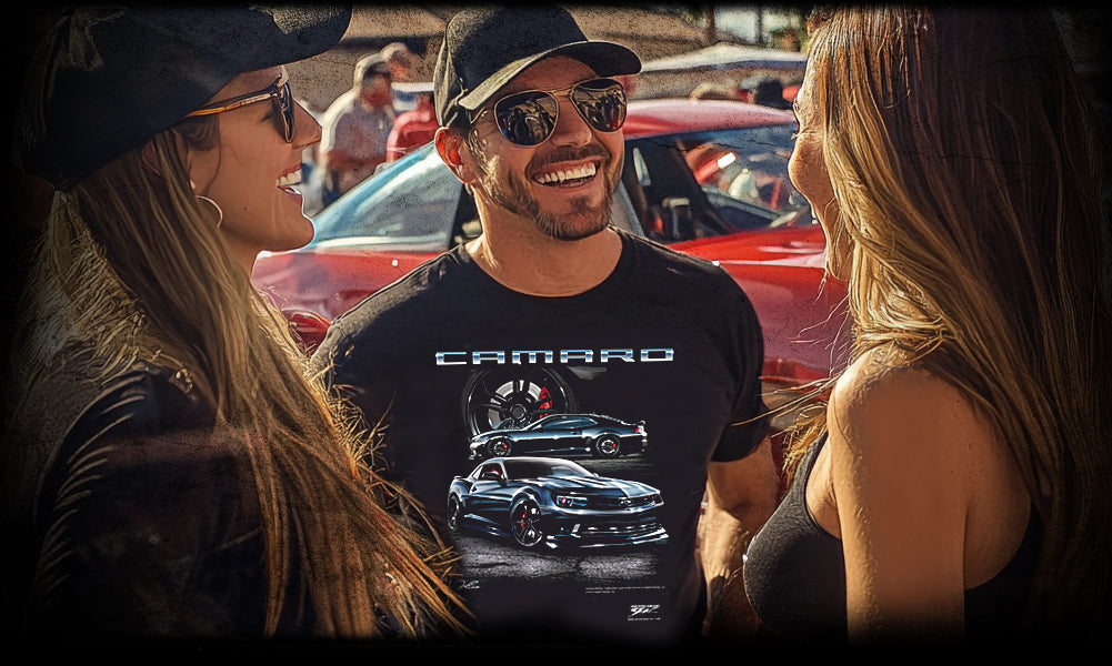 Photo of a man and women wearing Camaro t-shirts and smiling